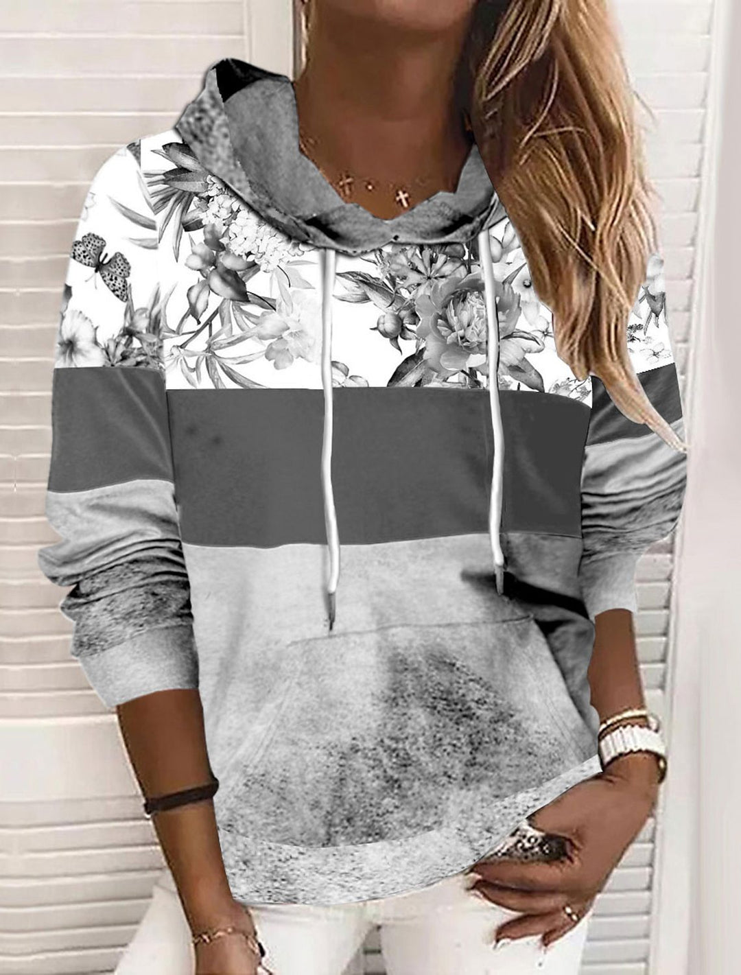 Damer hooded sweatshirt med blommig design och färgblock Mirla-Eva Jonsson
