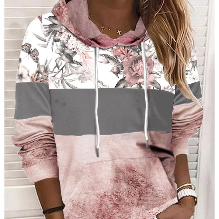 Damer hooded sweatshirt med blommig design och färgblock Mirla-Eva Jonsson