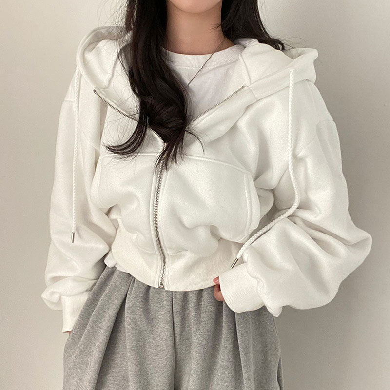 Damer hooded sweatshirt med oversized skärning och praktiska fickor Mirla-Eva Jonsson