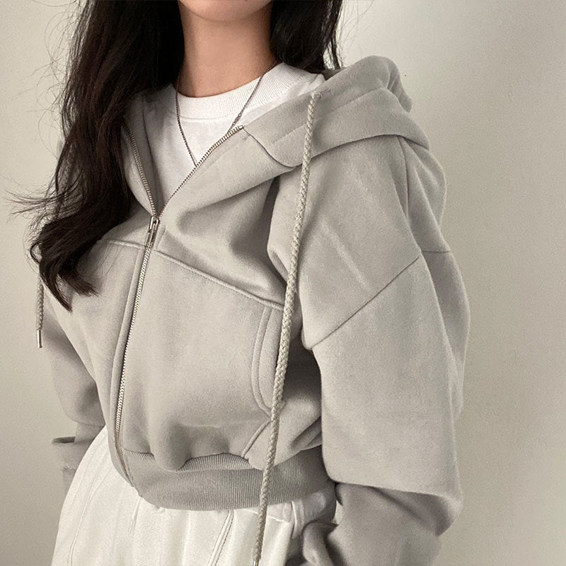 Damer hooded sweatshirt med oversized skärning och praktiska fickor Mirla-Eva Jonsson