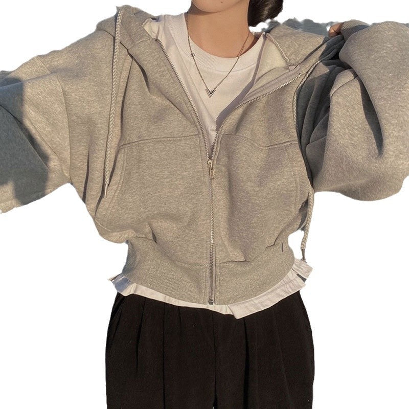 Damer hooded sweatshirt med oversized skärning och praktiska fickor Mirla-Eva Jonsson