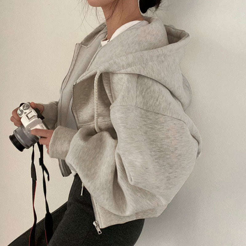 Damer hooded sweatshirt med oversized skärning och praktiska fickor Mirla-Eva Jonsson