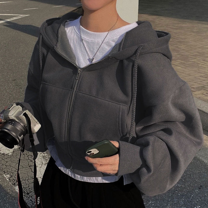 Damer hooded sweatshirt med oversized skärning och praktiska fickor Mirla-Eva Jonsson