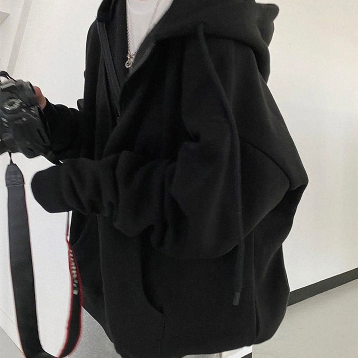 Damer hooded sweatshirt med oversized skärning och praktiska fickor Mirla-Eva Jonsson