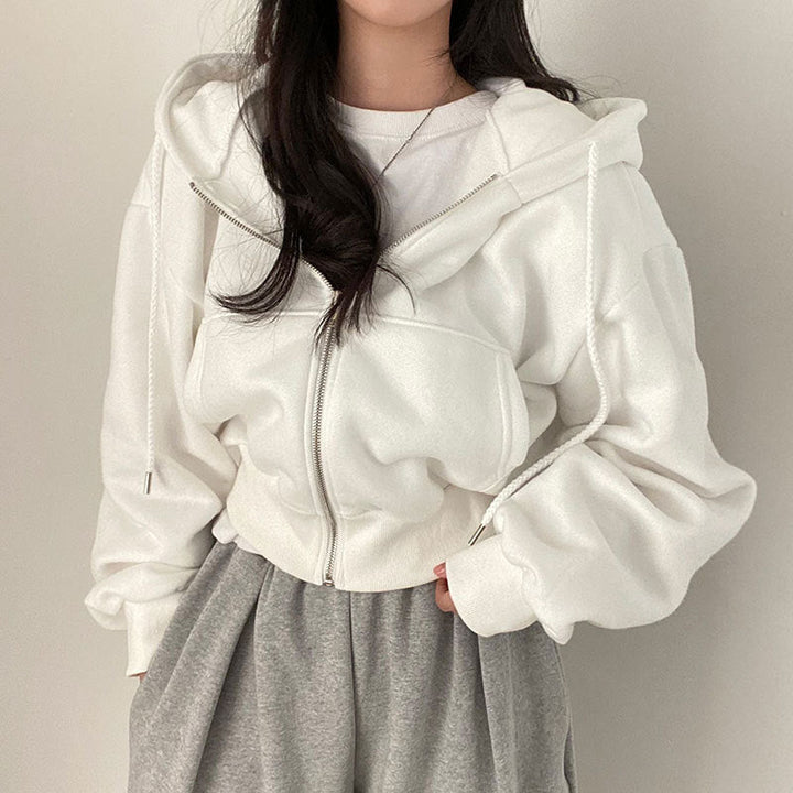 Damer hooded sweatshirt med oversized skärning och praktiska fickor Mirla-Eva Jonsson