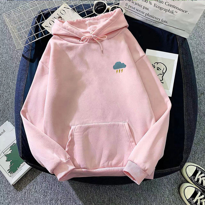 Damer hoodie med kreativ moln design Mirla-Eva Jonsson