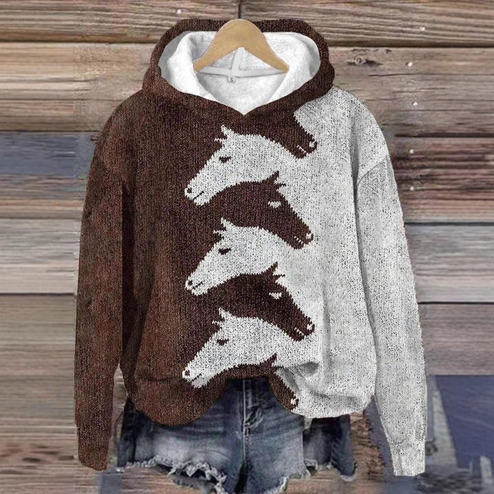 Damer hoodie med kreativt hästmönster och bekväm passform Mirla-Eva Jonsson