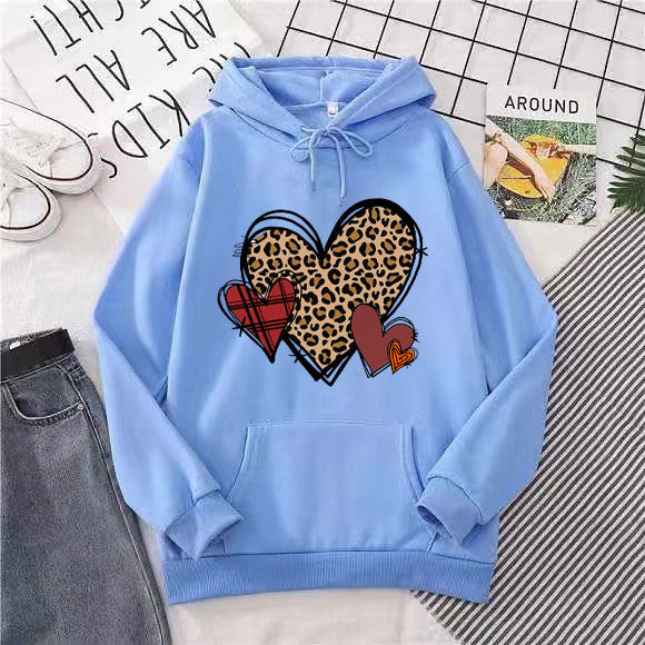 Damer hoodie med lekfullt hjärmönster Mirla-Eva Jonsson