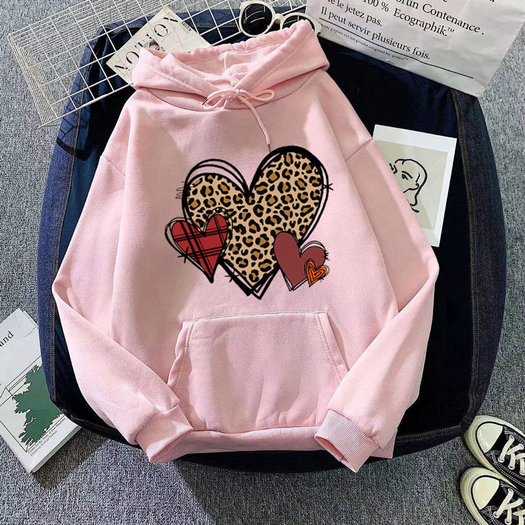Damer hoodie med lekfullt hjärmönster Mirla-Eva Jonsson
