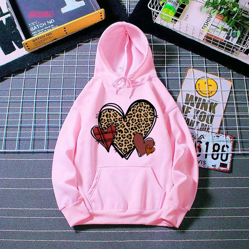 Damer hoodie med lekfullt hjärmönster Mirla-Eva Jonsson