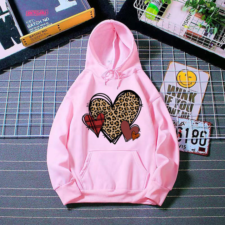 Damer hoodie med lekfullt hjärmönster Mirla-Eva Jonsson