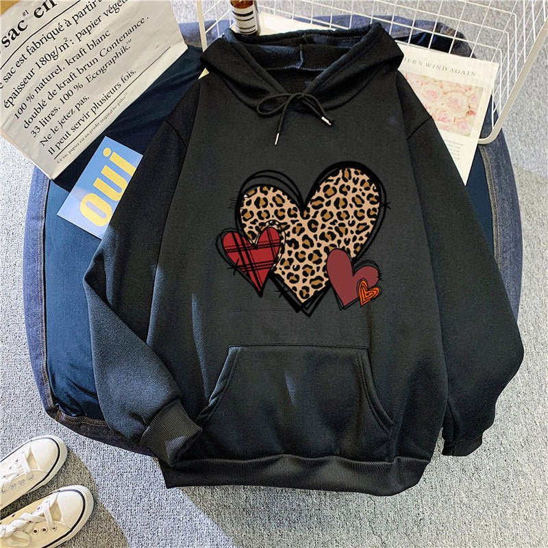 Damer hoodie med lekfullt hjärmönster Mirla-Eva Jonsson