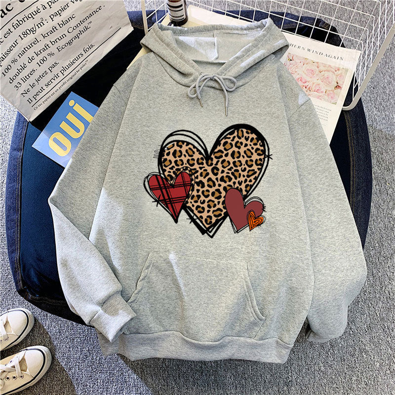 Damer hoodie med lekfullt hjärmönster Mirla-Eva Jonsson