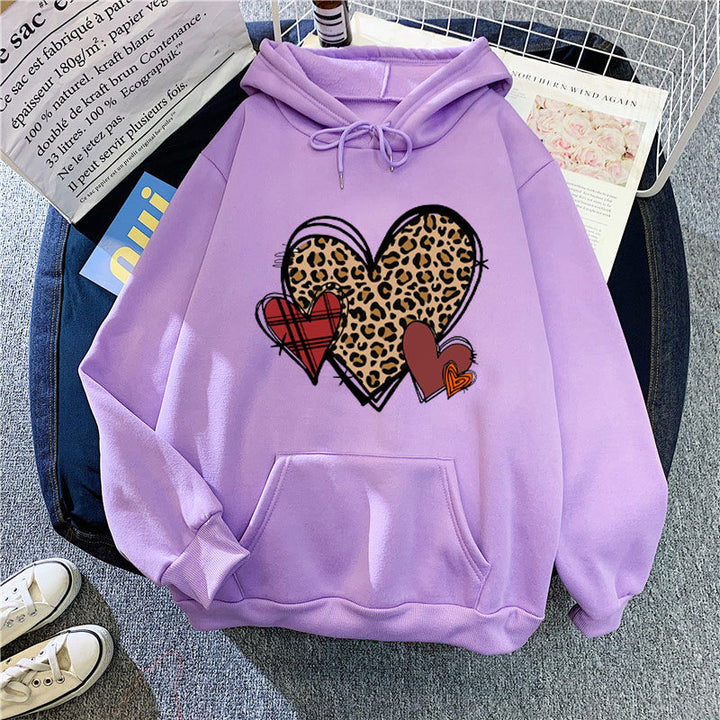 Damer hoodie med lekfullt hjärmönster Mirla-Eva Jonsson