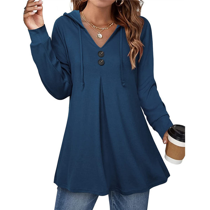Damer hoodie tunika med knapppDetalj och asymmetrisk skärning Mirla-Eva Jonsson