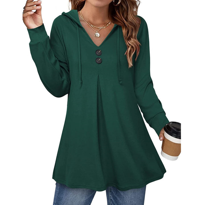 Damer hoodie tunika med knapppDetalj och asymmetrisk skärning Mirla-Eva Jonsson