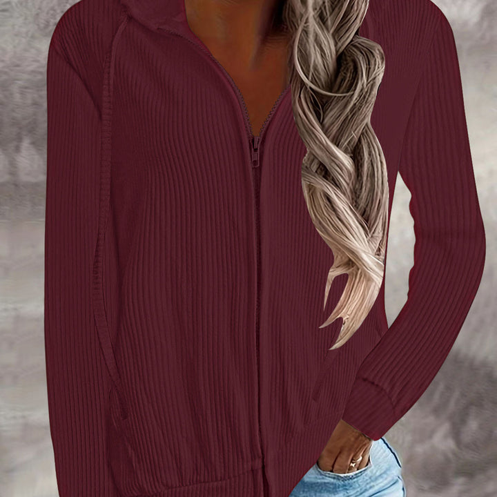 Damer hoodiejacka i modern ribbstickad design med fickor Mirla-Eva Jonsson