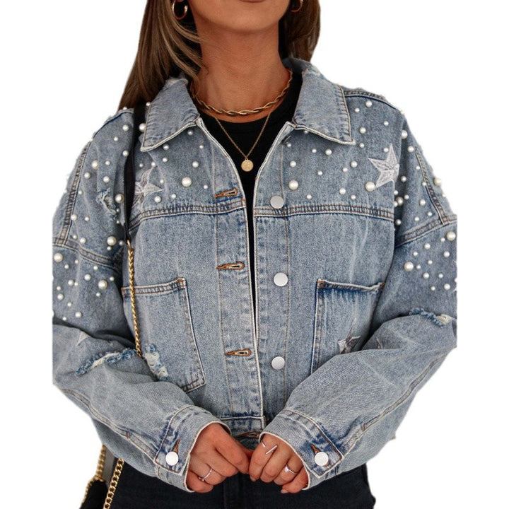Damer jeansjacka med iögonfallande applikationer och oversized skärning Mirla-Eva Jonsson