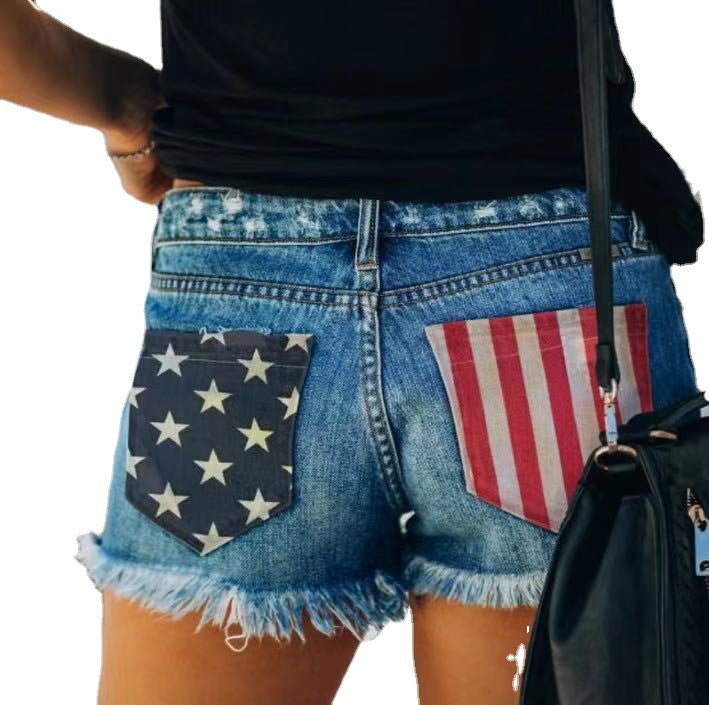 Damer jeansshorts i retrostil med unika patchdetaljer Mirla-Eva Jonsson