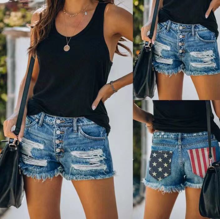 Damer jeansshorts i retrostil med unika patchdetaljer Mirla-Eva Jonsson