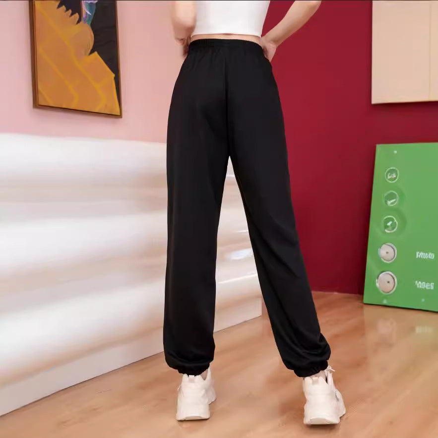 Damer joggingsbyxor med färgglad fjärils-motiv Mirla-Eva Jonsson