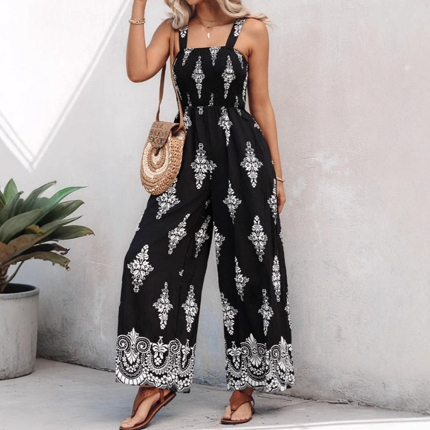 Damer jumpsuit med elastisk midjeband och blommiga dekorationer Mirla-Eva Jonsson