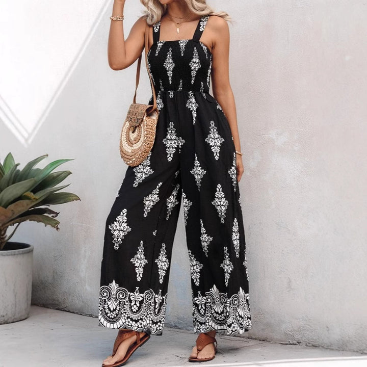 Damer jumpsuit med elastisk midjeband och blommiga dekorationer Mirla-Eva Jonsson