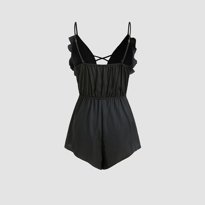 Damer jumpsuit med volang och djup V-hals Mirla-Eva Jonsson