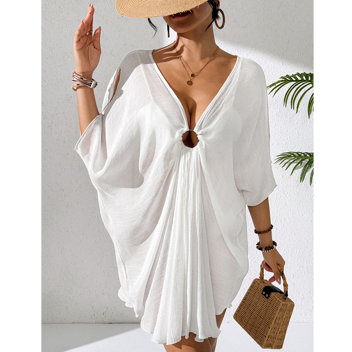 Damer kaftan med djup V-ringning och indraget design Mirla-Eva Jonsson