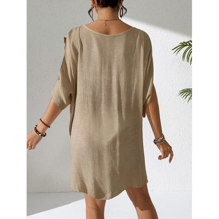 Damer kaftan med djup V-ringning och indraget design Mirla-Eva Jonsson