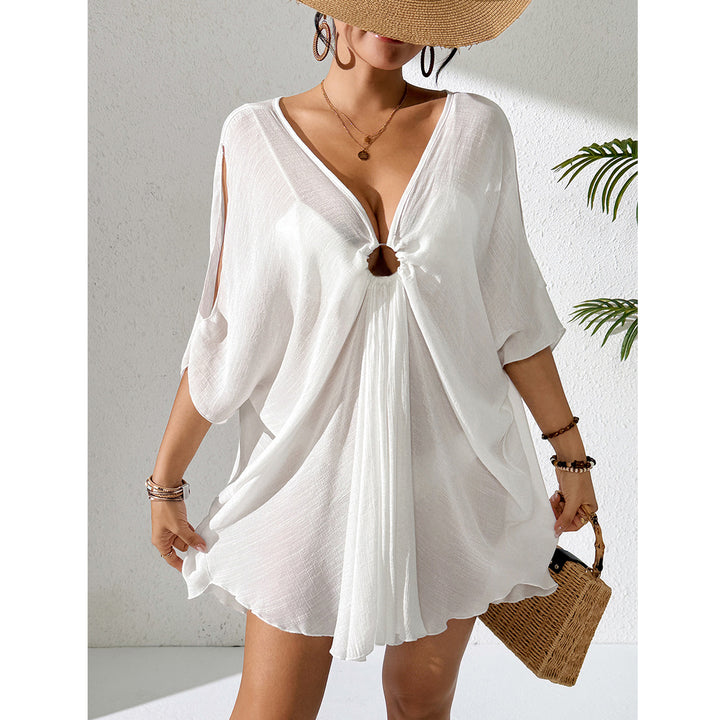 Damer kaftan med djup V-ringning och indraget design Mirla-Eva Jonsson