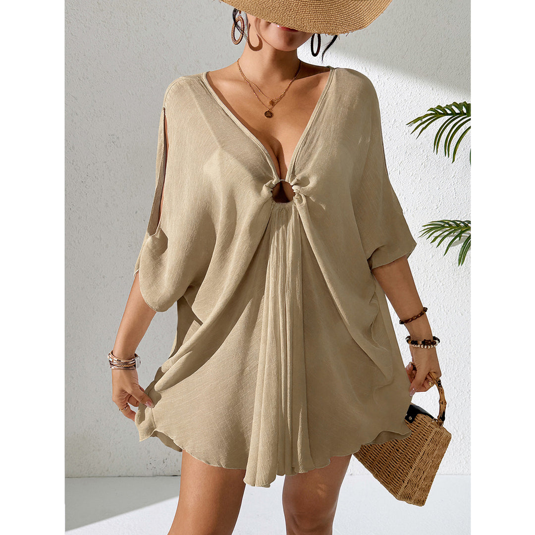 Damer kaftan med djup V-ringning och indraget design Mirla-Eva Jonsson