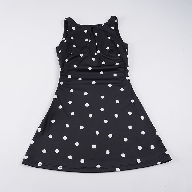 Damer klänning i lekfullt polka prickig design med flödande snitt Mirla-Eva Jonsson