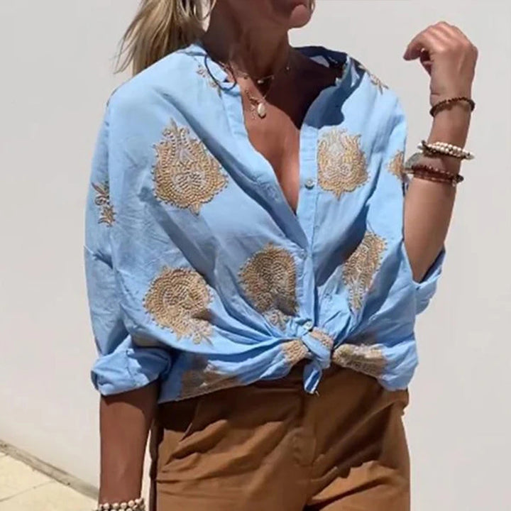 Damer knapplösa blus med blommönster broderier Mirla-Eva Jonsson