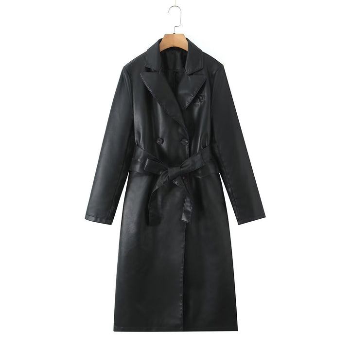 Damer konstläder trenchcoat med midjebälte och elegant ficksydd Mirla-Eva Jonsson