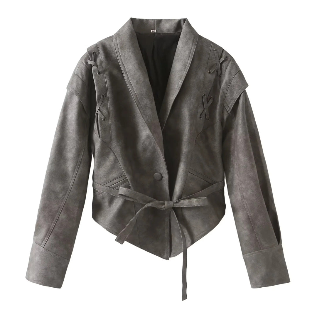 Damer konstläderblazer i modern design med praktiskt bälte Mirla-Eva Jonsson