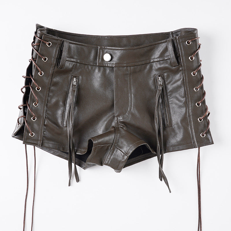 Damer konstlädershorts med dekorativa knapprand detaljer Mirla-Eva Jonsson