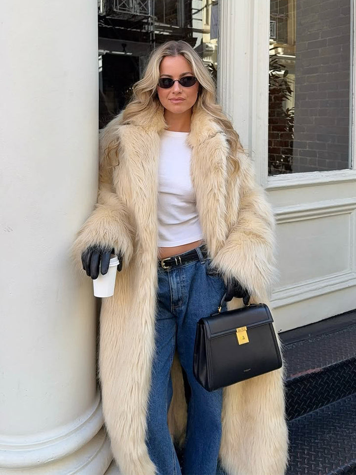 Damer konstpälsrock med voluminösa ärmar och elegant skärning Eva Jonsson-Eva Jonsson