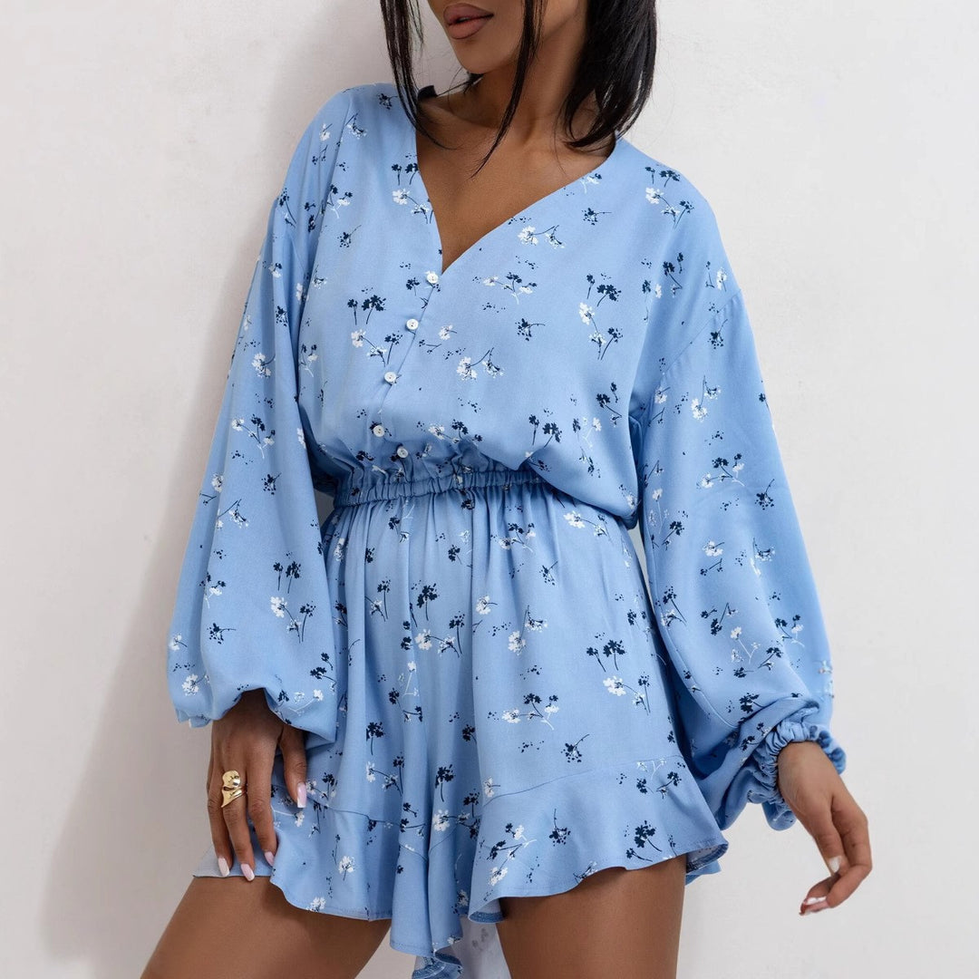 Damer kort blus med volanger och blommig design Mirla-Eva Jonsson
