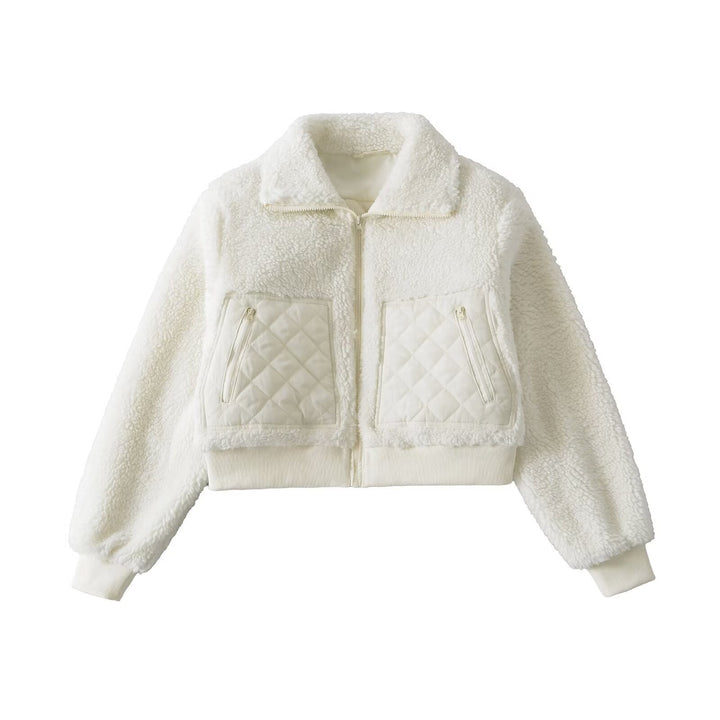 Damer kort övergångjacka med mjukt foder av teddy-material och modiga quiltade detaljer Mirla-Eva Jonsson