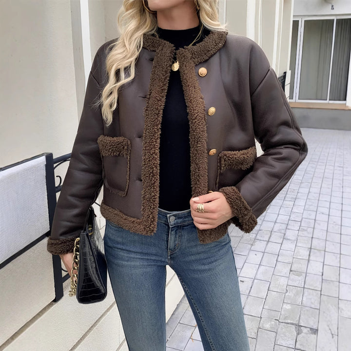 Damer kort skuren texturjacka med dolda knappar och fickor Mirla-Eva Jonsson