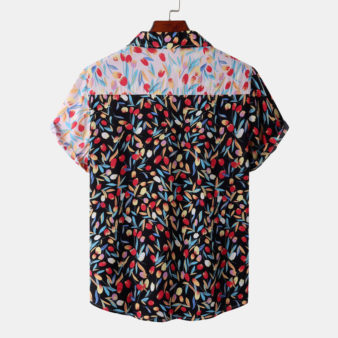 Damer kortärmad blus med blommigt patchwork-design Mirla-Eva Jonsson