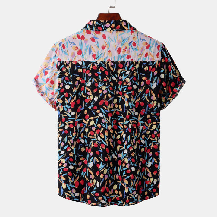 Damer kortärmad blus med blommigt patchwork-design Mirla-Eva Jonsson