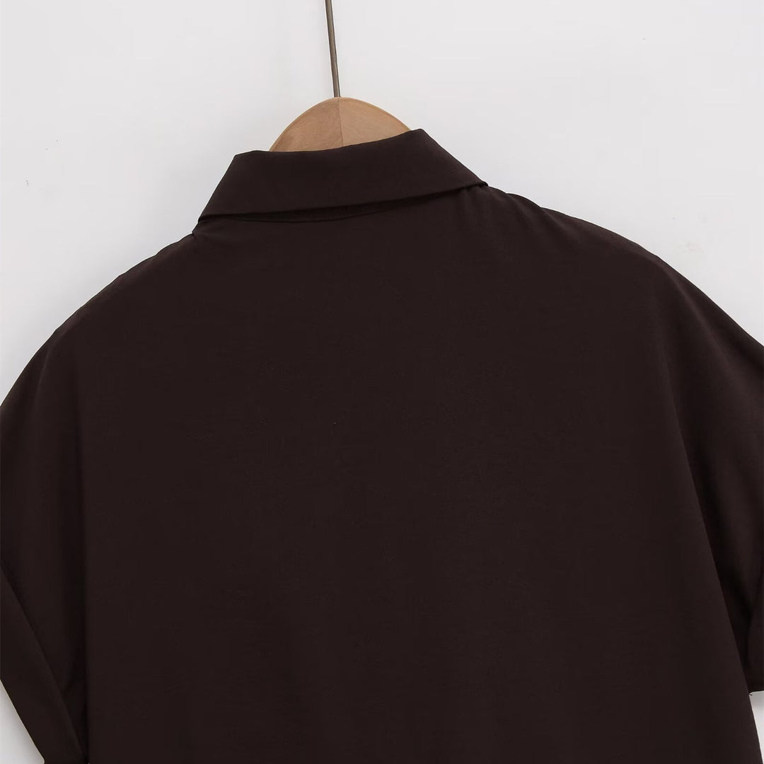 Damer kortärmad blus med knutdetalj och elegant snitt Mirla-Eva Jonsson