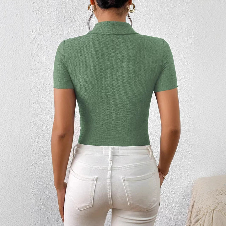 Damer kortärmad blus med strukturerad design och hjärtformade knappar Mirla-Eva Jonsson