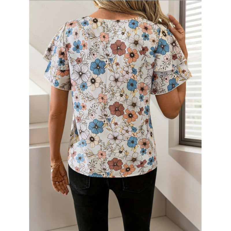 Damer kortärmad blus med volang och blommönster Mirla-Eva Jonsson
