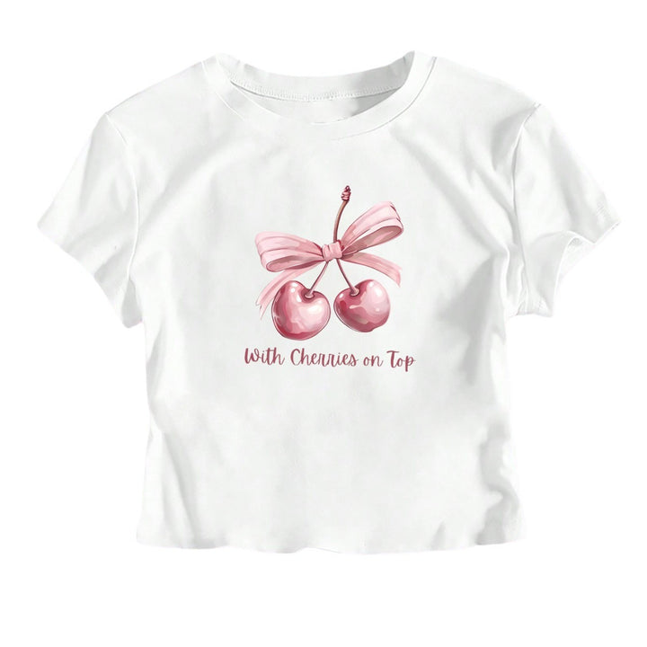 Damer kortärmad crop-t-shirt med glad körsbärsmotiv och snöreapplikation Mirla-Eva Jonsson