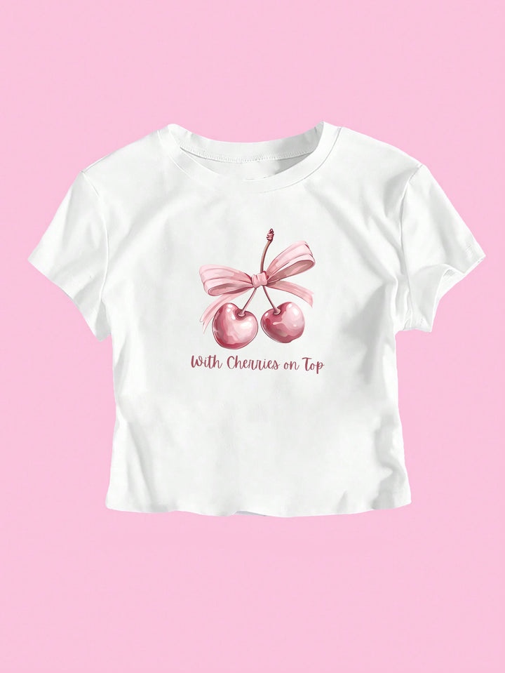 Damer kortärmad crop-t-shirt med glad körsbärsmotiv och snöreapplikation Mirla-Eva Jonsson