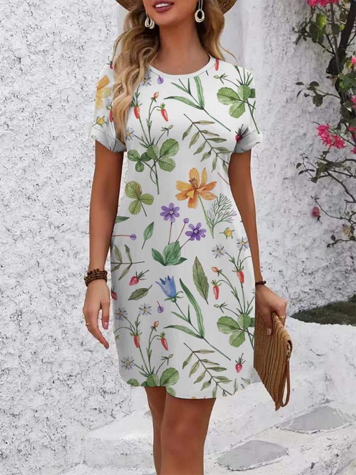 Damer kortärmad klänning med botaniskt tryck Mirla-Eva Jonsson