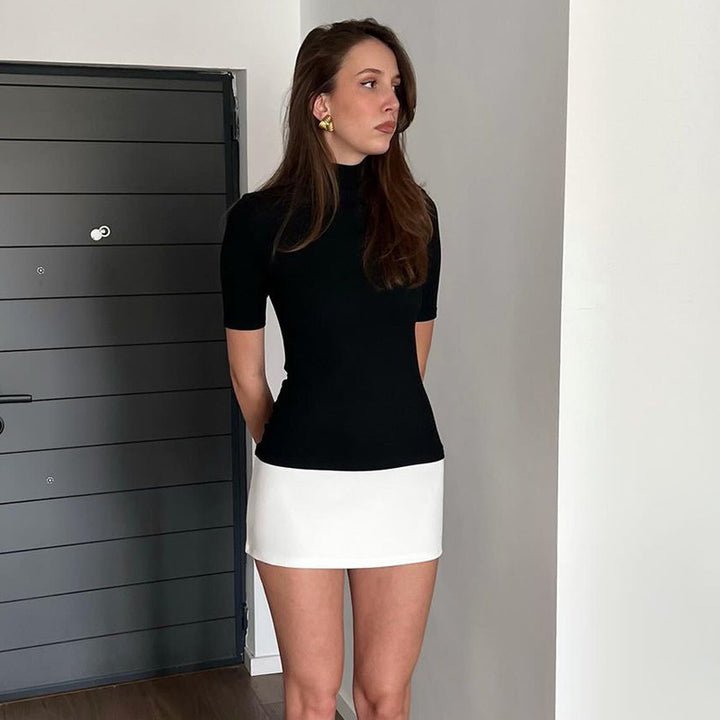 Damer kortärmad topp med stilfull polokrage och moderiktig snitt Mirla-Eva Jonsson